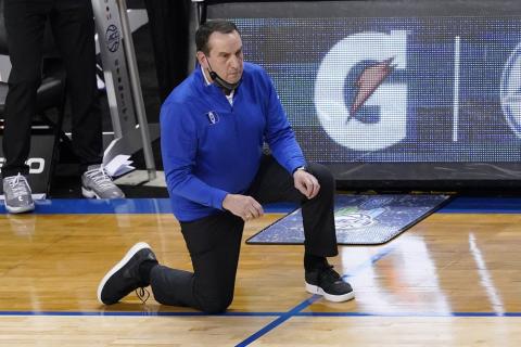Duke head coach Mike Krzyzewski watches the action during the second half of a game against Louisville in the second round of the Atlantic Coast Conference tournament on Wednesday in Greensboro, N.C. (GERRY BROOME/Associated Press)