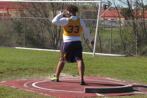 Columbia’s Nate Walmsley gets set to throw during the shot put at Tuesday’s Santa Fe mini meet. (COURTESY)