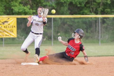 Columbia second baseman Sofia Arata can’t hold onto a throw as Dixie County left fielder Emily Chewning slides safely into second base Monday night. (BRENT KUYKENDALL/Lake City Reporter)