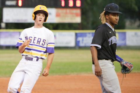 Columbia outfielder Branson Mann advances to third base on a passed ball against Trinity Christian on Friday night. (BRENT KUYKENDALL/Lake City Reporter)