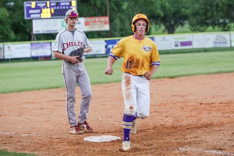 Columbia first baseman Ty Wehinger takes a lead off of third base against Chiles on Tuesday night. (BRENT KUYKENDALL/Lake City Reporter)