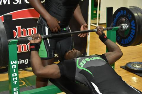Suwannee’s Jaquez Moore performs the bench press during Thursday’s District 3-2A Meet. (ROB WOLFE/Special to the Reporter)