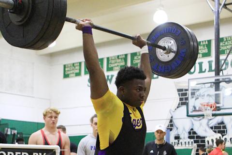 Columbia’s Julius Moreland finishes his clean and jerk during the Region 1-2A Meet on Friday. (PAUL BUCHANAN/Special to the Reporter)
