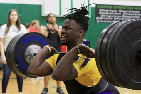 Columbia’s Tyler Ford performs the clean and jerk during the Region 1-2A meet on Friday. Ford placed fourth in the 238 weight class, earning an at-large bid to the Class 2A state meet on Tuesday. (PAUL BUCHANAN/Special to the Reporter)