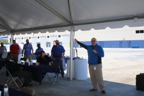 Jason Easom, Werner terminal manager in Lake City, introduces Derek Leathers, Werner president and CEO, during the company’s Spring Driver Appreciation Week activities Monday morning. (TONY BRITT/Lake City Reporter)