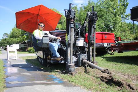Carlos Mendez uses a JT 20 Ditchwitch directional boring drill while instilling pipe that will house fiber-optic cable. Hargray Fiber is building a totally fiber-based network in Lake City to provide high speed internet, business telephone services and cable television. (TONY BRITT/Lake City Reporter)