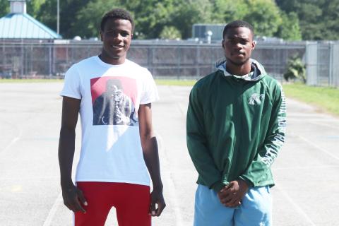 Columbia’s Seth Stockton (left) won a district title in the triple jump at Saturday’s District 2-3A meet, while James Williamson (right) won district crowns in the 100 and 200, breaking his own school record in the 200 by .03 seconds. (JORDAN KROEGER/Lake City Reporter)