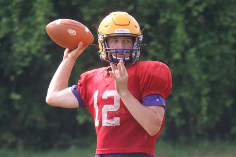 Columbia quarterback Kade Jackson throws a pass during Friday's practice. (JORDAN KROEGER/Lake City Reporter)