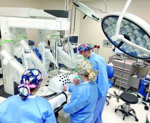 Lake City Medical Center staff test out the hospital’s new $1.6 million surgical robot, the da Vinci Xi Surgical Robot. (COURTESY)