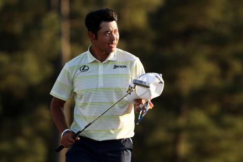 Hideki Matsuyama celebrates on the 18th green after winning the Masters at Augusta National Golf Club on Sunday in Augusta, Ga. (KEVIN C. COX/Getty Images/TNS)