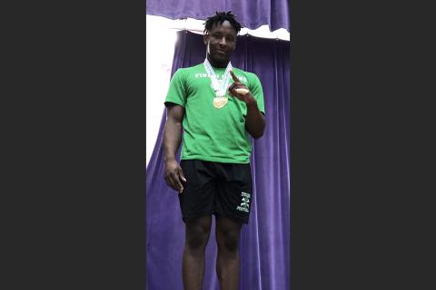 Suwannee’s Jaquez Moore celebrates on the podium after winning the Class 2A state title in the 183-pound weight class on Saturday. (COURTESY)