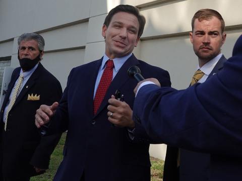 Florida Gov. Ron DeSantis leaves a West Palm Beach rally where he appeared live on "Fox & Friends" to sign a voting reform law on Thursday. (JOE CAVARETTA/South Florida Sun Sentinel/TNS)