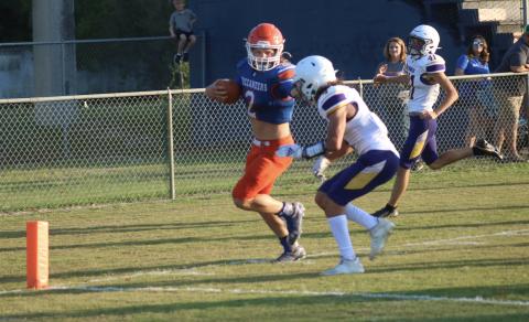 Branford receiver Cade Coker scored a touchdown against Bell during the teams’ spring game Monday night. (JAMIE WACHTER/Lake City Reporter)
