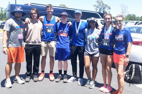 Branford’s coaches and athletes at the Class 1A state meet on Friday at the University of North Florida’s Hodges Stadium. Pictured are boys coach Tim Clark (from left), Justin Hernandez, Evan Dowdy, Bruce Criggall, Seth Humphries, Zamaria Granado, Nathalia Veal and girls coach Erin Clark. (COURTESY)
