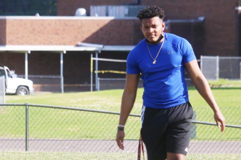 Columbia running back Jaelin Brown watches practice from the sideline last week. Brown is recovering from a torn ACL suffered at the end of last season. (JORDAN KROEGER/Lake City Reporter)
