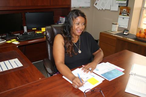 Ami Mitchell, Lake City Human Resources Department Director, works at her desk Wednesday afternoon. Mitchell began working at the city’s new human resources department director on April 5. (TONY BRITT/Lake City Reporter)