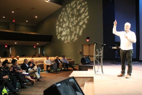 Matt Glover, New Life Christian Fellowship pastor, says a prayer for the nation Thursday afternoon during a National Day of Prayer service in New Life Christian Fellowship sanctuary. (TONY BRITT/Lake City Reporter)
