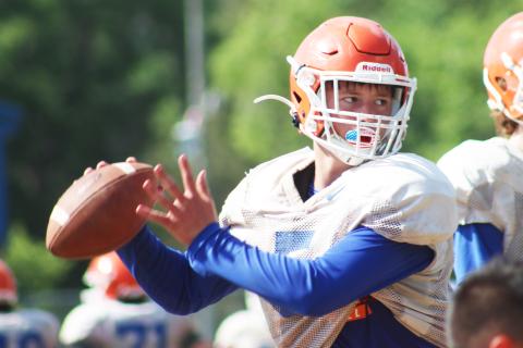 Branford quarterback Kyson Johnson sets to throw during Tuesday’s practice. (JAMIE WACHTER/Lake City Reporter)
