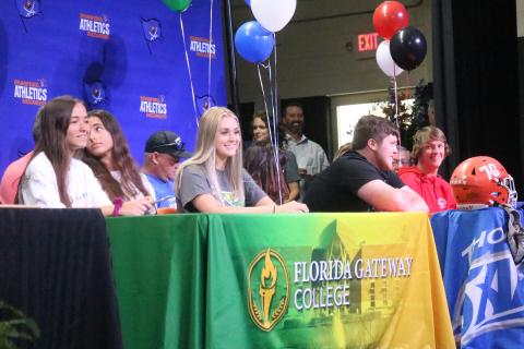 Branford twin sisters Kyla and Kayla Desmartin signed to run at Florida Gateway College on Thursday, while Blair Smith also signed with Florida Gateway College to play volleyball. Branford offensive lineman signed to play football at Thomas More University. Branford catcher Clay Williams signed to play baseball at Gardner-Webb. (JAMIE WACHTER/Lake City Reporter)