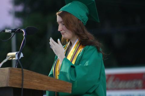 Valedictorian Eva Forehand chokes back tears during her graduation speech. (JAMIE WACHTER/Lake City Reporter)