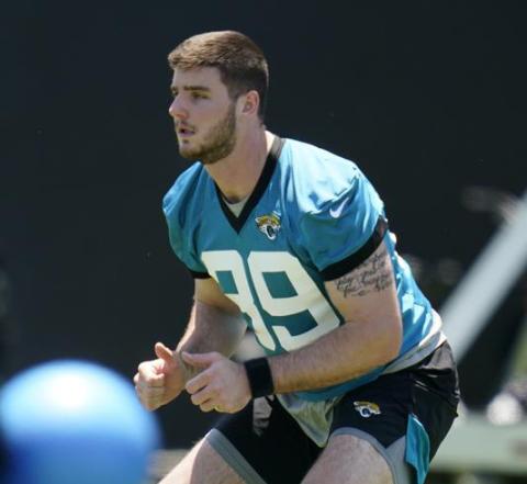 Jacksonville Jaguars tight end Luke Farrell performs a drill during rookie minicamp on Saturday in Jacksonville. (JOHN RAOUX/Associated Press)
