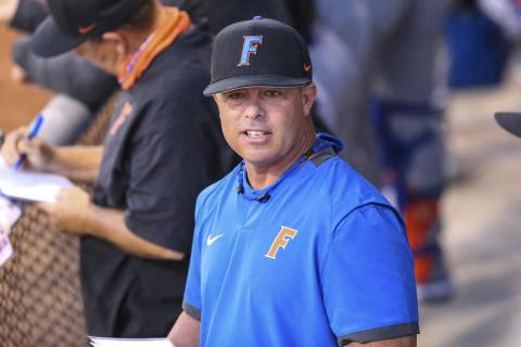 Florida head coach Kevin O'Sullivan watches from the dugout during a game against North Florida in on Feb. 23 in Jacksonville. Florida won two of three games against Vanderbilt over the weekend, and O’Sullivan hopes it’s a sign that the Gators are ready to make a strong run into the postseason. (AP FILE PHOTO)