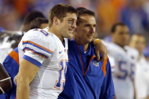Former Florida quarterback Tim Tebow, left, and former Florida coach Urban Meyer celebrate in the fourth quarter during a college football game against Georgia on Nov. 1, 2008, in Jacksonville. Tebow and Meyer are together again, this time in the NFL and with Tebow playing a new position. The former Florida star and 2007 Heisman Trophy-winning quarterback signed a one-year contract with the Jacksonville Jaguars on Thursday and will attempt to revive his pro career as a tight end. (AP FILE PHOTO)