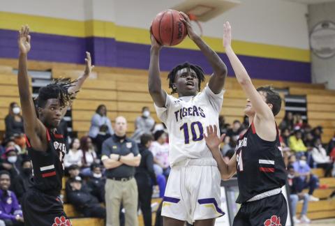 Columbia guard Isaac Broxey rises to shoot against Baker County last season. (BRENT KUYKENDALL/Lake City Reporter)