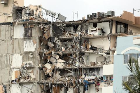 The 12-story oceanfront Champlain Towers South Condo in Surfside is shown on Friday. A large portion of the building collapsed very early Thursday morning. (AMY BETH BENNETT/South Florida Sun-Sentinel/TNS)