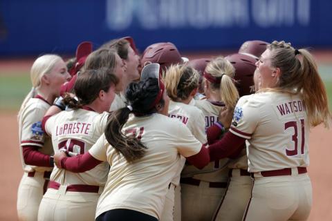 Florida State players celebrates after defeating Arizona in Saturday’s Women's College World Series game in Oklahoma City. (ALONZO ADAMS/Associated Press)