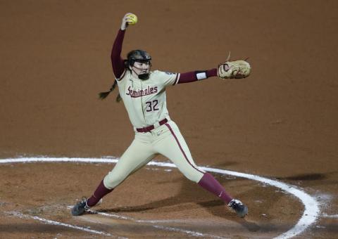 Florida State's Kathryn Sandercock (32) delivers a pitch to Oklahoma State in the first inning of Saturday’s Women’s College World Series game in Oklahoma City. (ALONZO ADAMS/Associated Press)