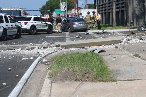 A Chrysler sedan led law enforcement officers on a chase topping 100 mph just before 11 a.m. Tuesday morning. The driver, 32-year-old Tyrece Roundtree, smashed into the side of a medical services van before crashing to a stop at the intersection of U.S. Highway 90 and N. Marion Ave. (JAMIE WACHTER/Lake City Reporter)