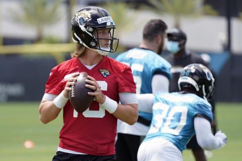 Jacksonville Jaguars quarterback Trevor Lawrence looks for a receiver during practice on Tuesday in Jacksonville. (JOHN RAOUX/Associated Press)