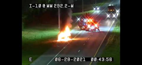 Suwannee County Fire Rescue crews respond to a burning van on Interstate 10 west just after midnight Monday morning. (COURTESY)