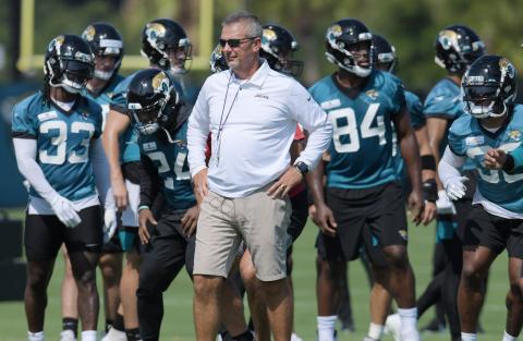 Jacksonville Jaguars head coach Urban Meyer stands on the sidelines during drills at minicamp on June 15. The NFL fined Meyer and the Jaguars for violations of league rules on non-contact practices. (TRIBUNE NEWS SERVICE)