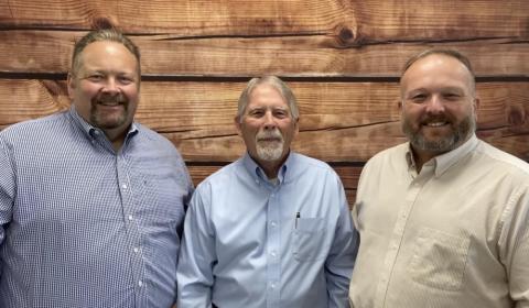 Lake City Reporter Publisher Todd Wilson (left) meets with GulfCoast Financial Services Founder and CEO John Kuykendall and President Brent Kuykendall to discuss a First Responders Appreciation Lunch set for Friday. (COURTESY)