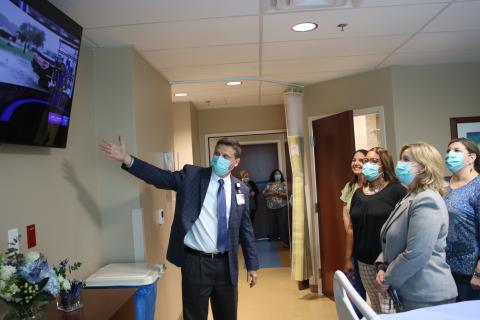 Steve Nelson (clockwise from left), Lake City Medical Center Assistant Vice President of Operations, shows Tassie Nelson, Connie Anderson and Sylvia Lollis some of the state of the art medical equipment that are housed in new rooms at the hospital during the hospital’s ribbon cutting and groundbreaking event Thursday. (TONY BRITT/Lake City Reporter)