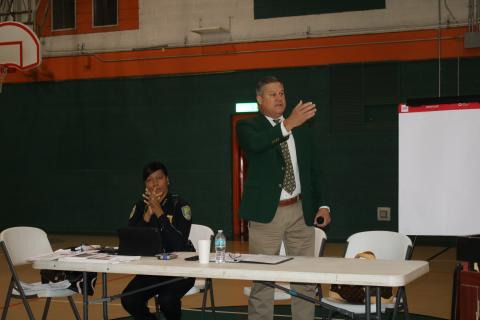 Lake City Police Chief Argatha Gilmore (left) listens while Columbia County Sheriff Mark Hunter addresses the residents Saturday morning at the Community Conversations event at Richardson Community Center. (TONY BRITT/Lake City Reporter)