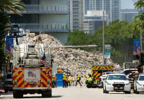 Workers search the site of the collapsed Champlain Towers South building in Surfside on July 11. The search was called off Friday after a month of painstaking work. (MEGHAN McCARTHY/Palm Beach Post/TNS)