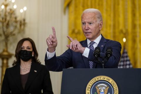 U.S. President Joe Biden, flanked by Secretary of Defense Lloyd Austin, Vice President Kamala Harris, Secretary of State Antony Blinken and White House National Security Advisor Jake Sullivan, delivers remarks on the evacuation of American citizens and their families, SIV applicants and their families, and vulnerable Afghans from Afghanistan, in the East Room of the White House complex on Friday in Washington, DC. (KENT NISHIMURA/Los Angeles Times)