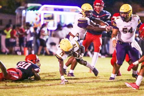 Columbia running back Leo Robinson stumbles to the ground on a carry during Friday's Preseason Classic against Vanguard. (BRENT KUYKENDALL/Lake City Reporter)