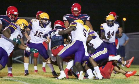 Columbia linebacker Jaden Robinson (5) makes a tackle against Vanguard during the Preseason Classic on Aug. 20. (BRENT KUYKENDALL/Lake City Reporter)