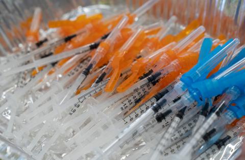 Syringes full of the Pfizer vaccine are ready to go at Oakland University as they hold a Covid vaccine clinic for 18-24-year olds on April 13. (TRIBUNE NEWS SERVICE)
