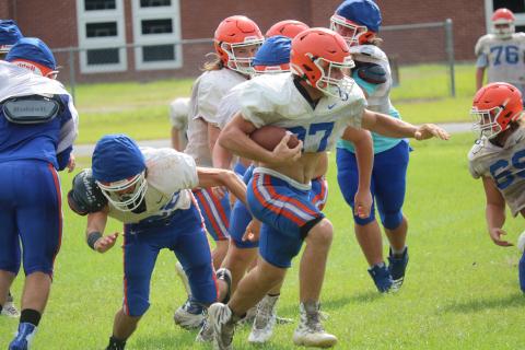 Branford running back Bodhi White turns up the field during practice on Aug. 13. (JAMIE WACHTER/Lake City Reporter)