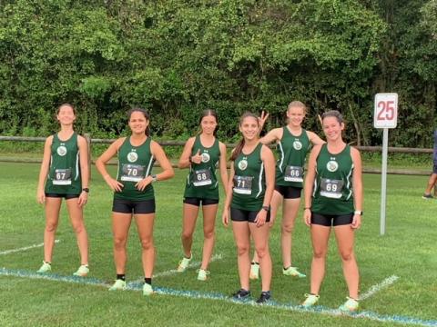 FGC runners Kayla Desmartin (from left), Merlin Leal, Kyla Desmartin, Savana Thomas, Ariel Anderson and Fallon Flynn are pictured at the starting line prior to Saturday's TCC Open. (COURTESY)