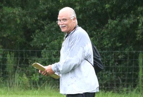 Fort White interim co-head coach Roy Harden looks on during practice on Tuesday. (MORGAN MCMULLEN/Lake City Reporter)