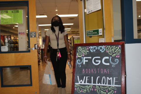 Mariah Carson, who is enrolled at Florida Gateway College for Fall 2021 courses as a criminal justice major, leaves the school bookstore with educational supplies on Monday afternoon. (TONY BRITT/Lake City Reporter)