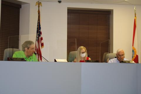 City Council Member Todd Sampson (left) discusses an item at Monday’s budget workshop. (TONY BRITT/Lake City Reporter)