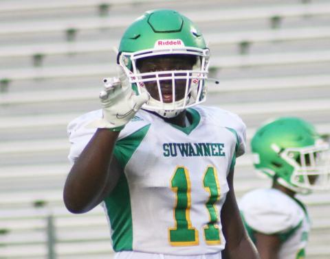 Suwannee linebacker Andrew Brown calls out a play to his defense during a team scrimmage on Saturday. (JAMIE WACHTER/Lake City Reporter)