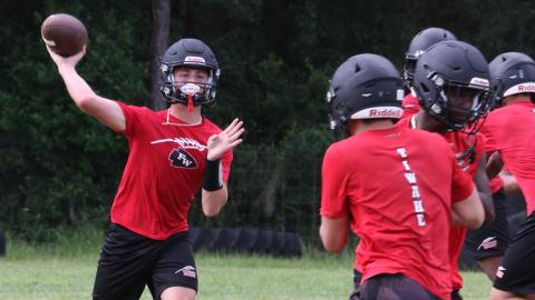 Fort White quarterback Clayton Philpot throws a pass during practice on Thursday. (MORGAN MCMULLEN/Lake City Reporter)